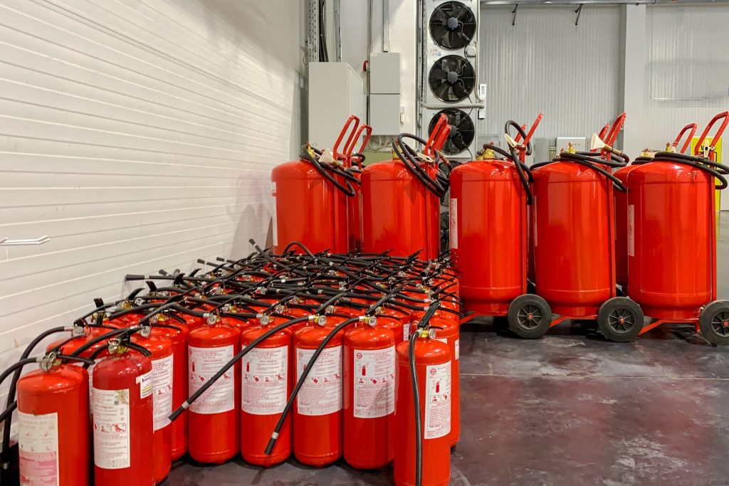 How fire suppression systems and fire extinguishers differ in functionality
